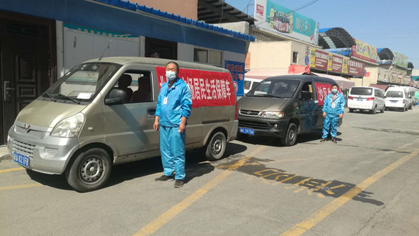 圖為：副食市場(chǎng)居民生活保障供應車(chē)輛_副本.jpg